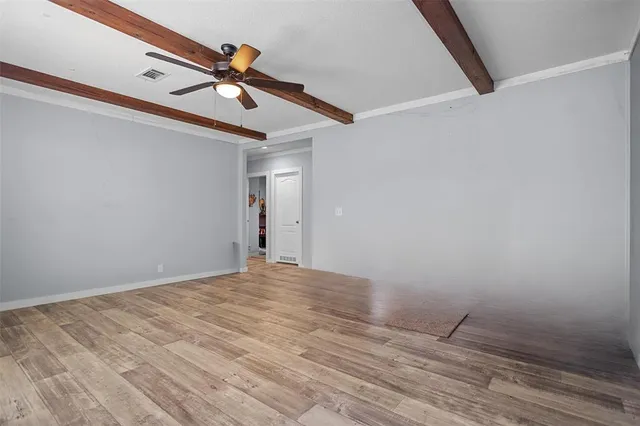 a house view with a sitting space and garden