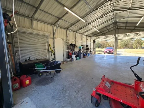 a view of parking garage with cars
