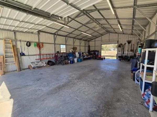 a view of a garage with cars
