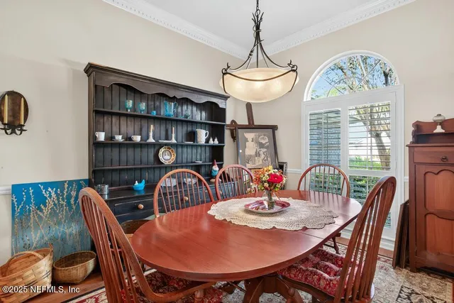 a living room with fireplace furniture and a wooden floor