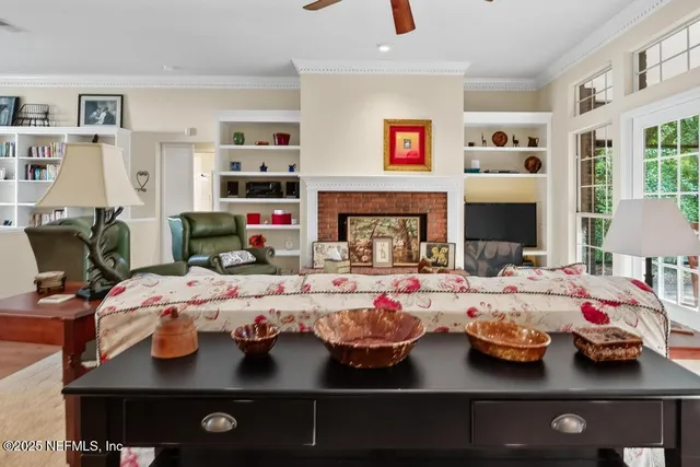 a kitchen with stainless steel appliances granite countertop a stove and a wooden cabinets
