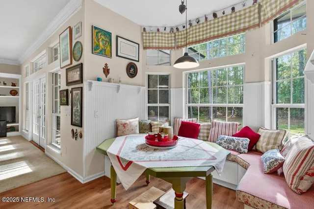 a room with furniture and a window