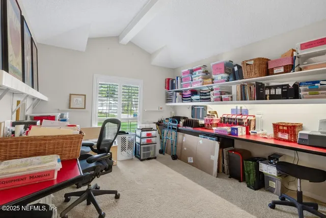 a spacious bathroom with a sink a mirror and a shower