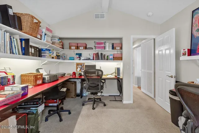 a bathroom with a sink vanity toilet and a mirror