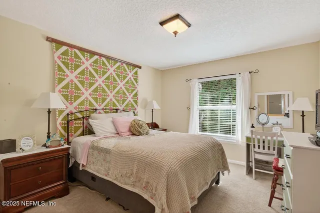 a outdoor view with a sitting space and large windows