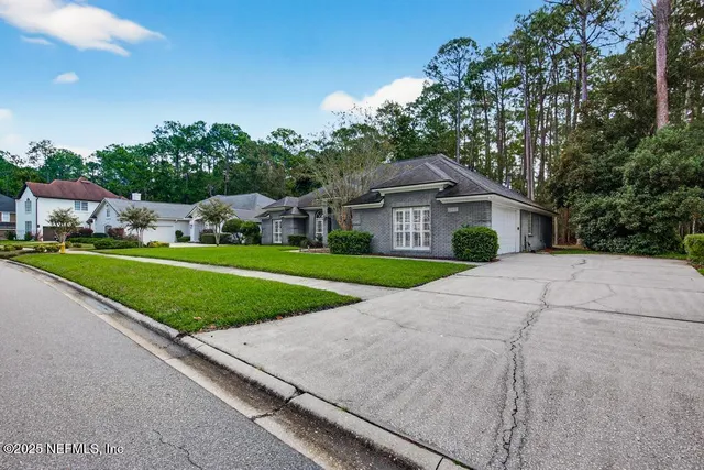 a view of a room with window and couch