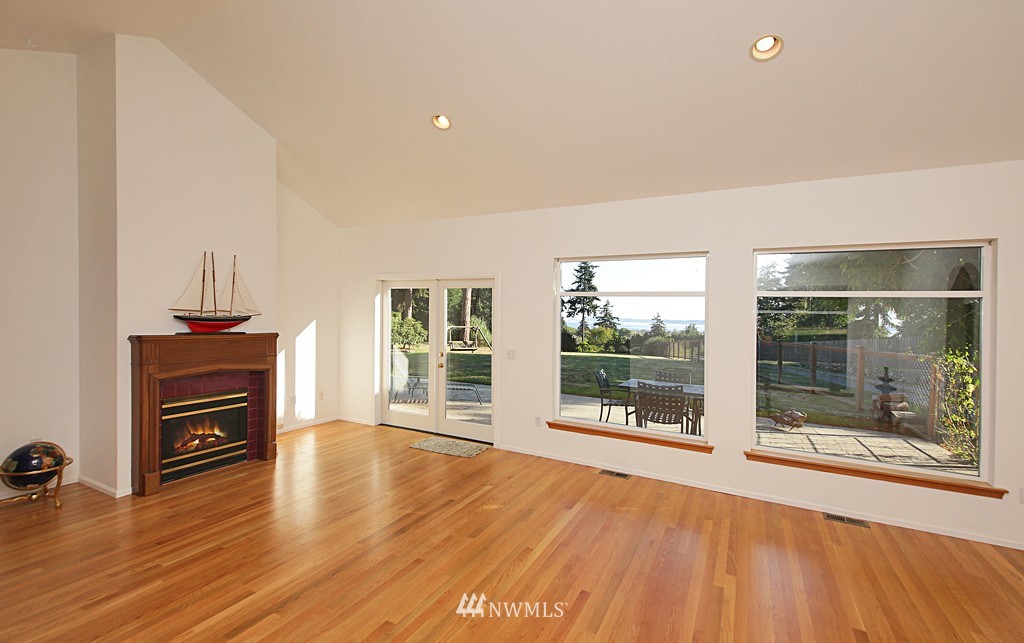 5723 Crow Haven Road Langley, WA 98260 - Photo 8 of 25 a view of room with window and wooden floor