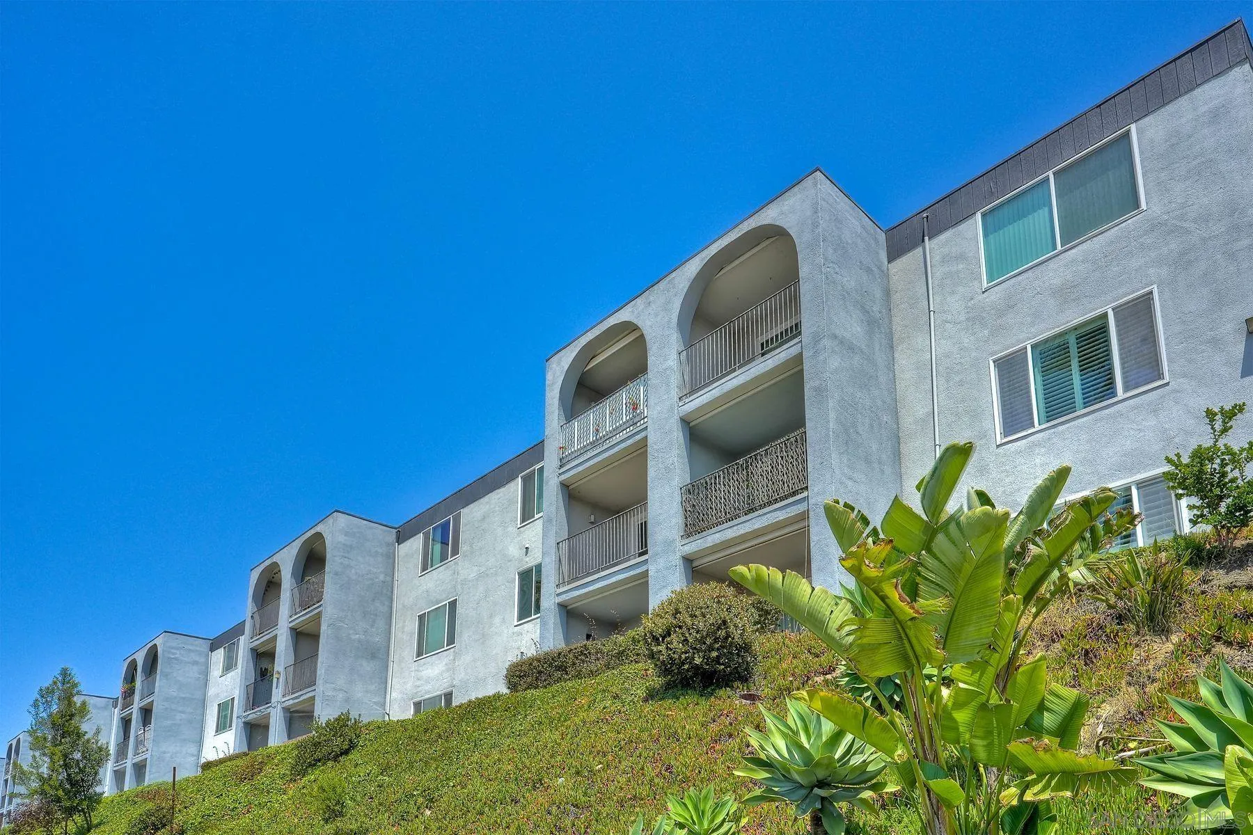 3606 Vista Rey, Unit 46 Oceanside, CA 92057 - Photo 35 of 36 a view of a multi story building