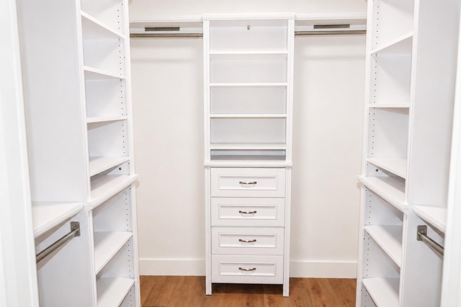 4815 Cleveland Street Hollywood, FL 33021 - Photo 22 of 31 a view of walk in closet with empty racks