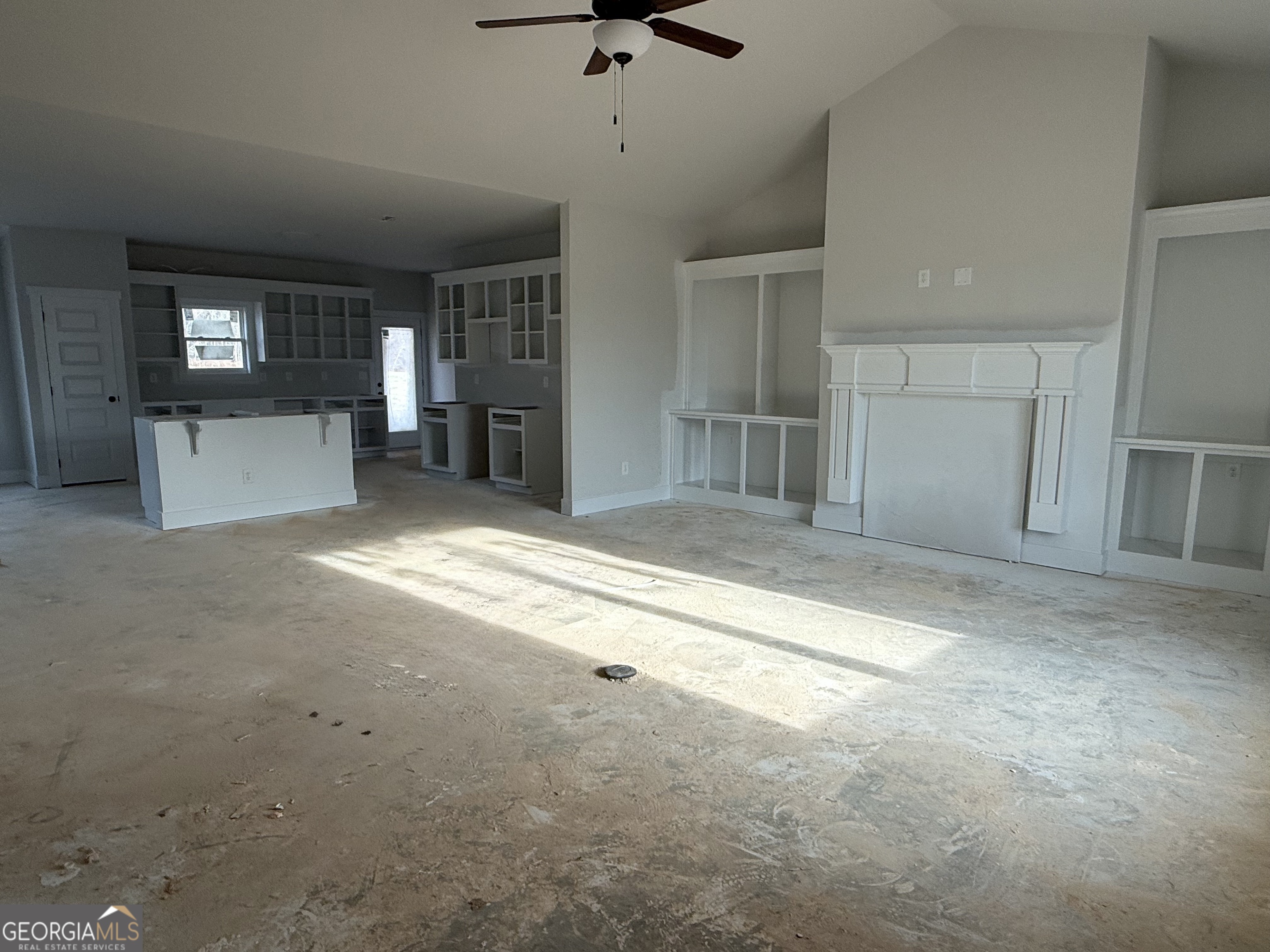 434 Cosby Road, Unit 3 Winder, GA 30680 - Photo 2 of 4 a view of a livingroom with a ceiling fan and window