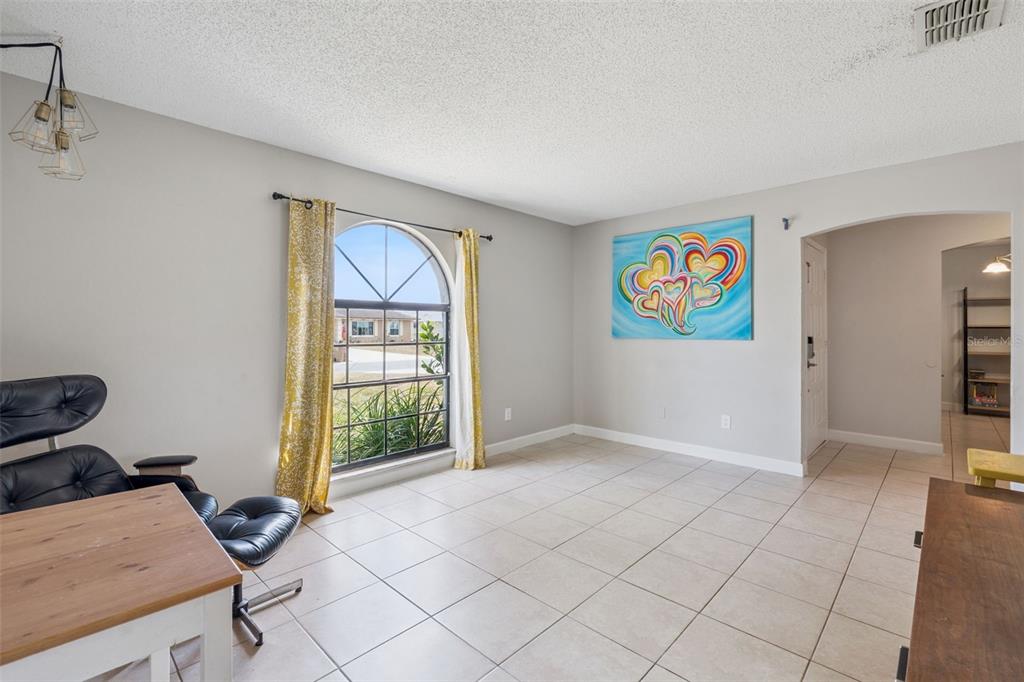 1070 Hali Ridge Court Kissimmee, FL 34747 - Photo 2 of 36 a view of an entryway with wooden floor