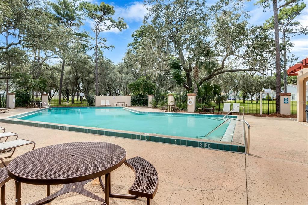 1070 Hali Ridge Court Kissimmee, FL 34747 - Photo 23 of 36 a view of a bench in a park