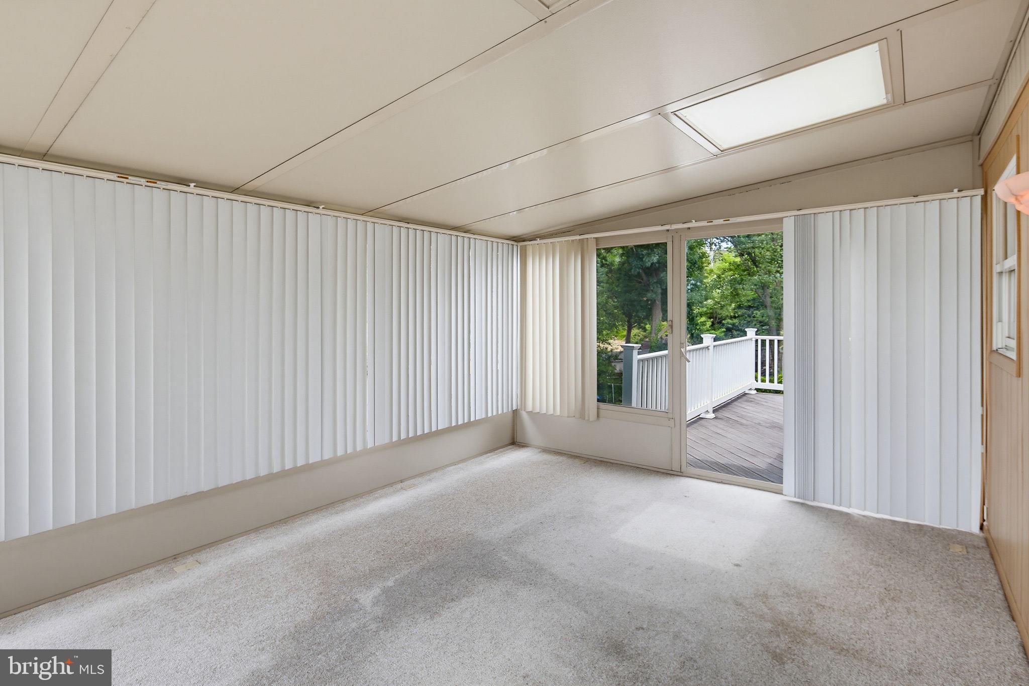 7802 Bastille Road Severn, MD 21144 - Photo 19 of 34 Bright and airy sunroom retreat.