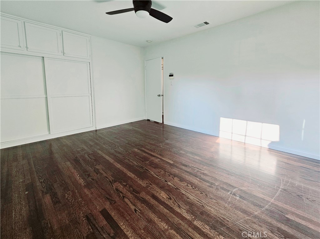 17501 Hamlin Street Lake Balboa, CA 91406 - Photo 16 of 26 a view of empty room with wooden floor