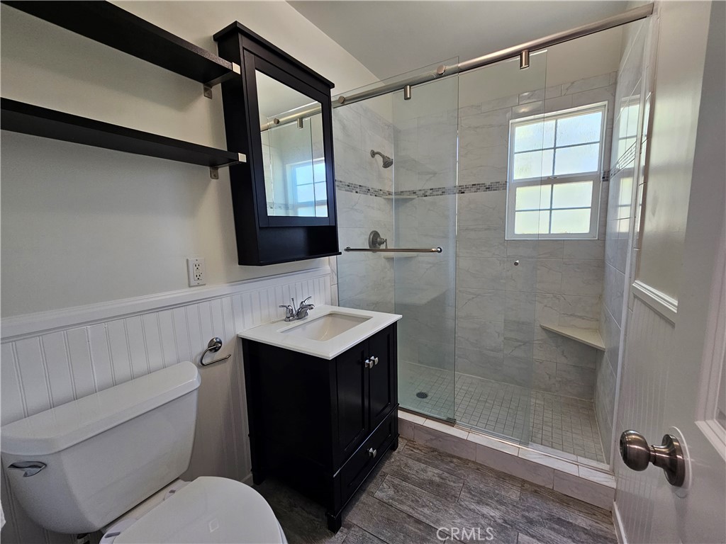 17501 Hamlin Street Lake Balboa, CA 91406 - Photo 22 of 26 a bathroom with a sink toilet and shower