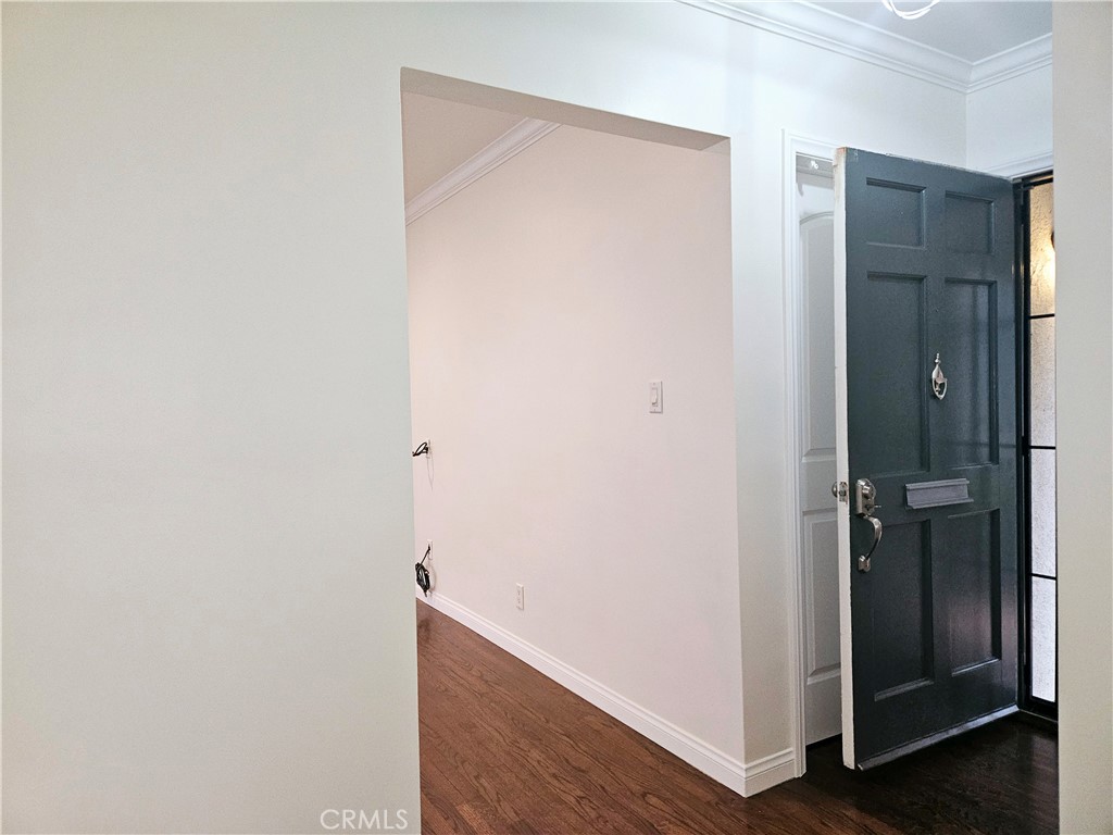 17501 Hamlin Street Lake Balboa, CA 91406 - Photo 3 of 26 an empty room with hallway