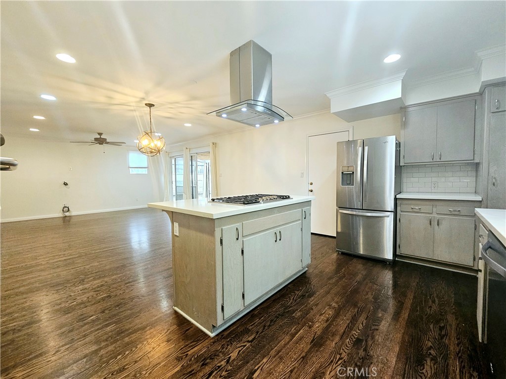 17501 Hamlin Street Lake Balboa, CA 91406 - Photo 6 of 26 a kitchen with stainless steel appliances a refrigerator and a stove top oven