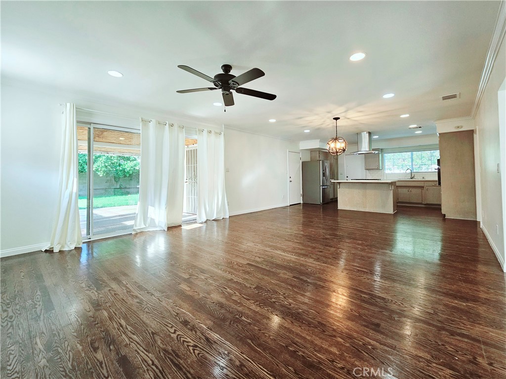 17501 Hamlin Street Lake Balboa, CA 91406 - Photo 26 of 26 a view of a living room and kitchen with a large window