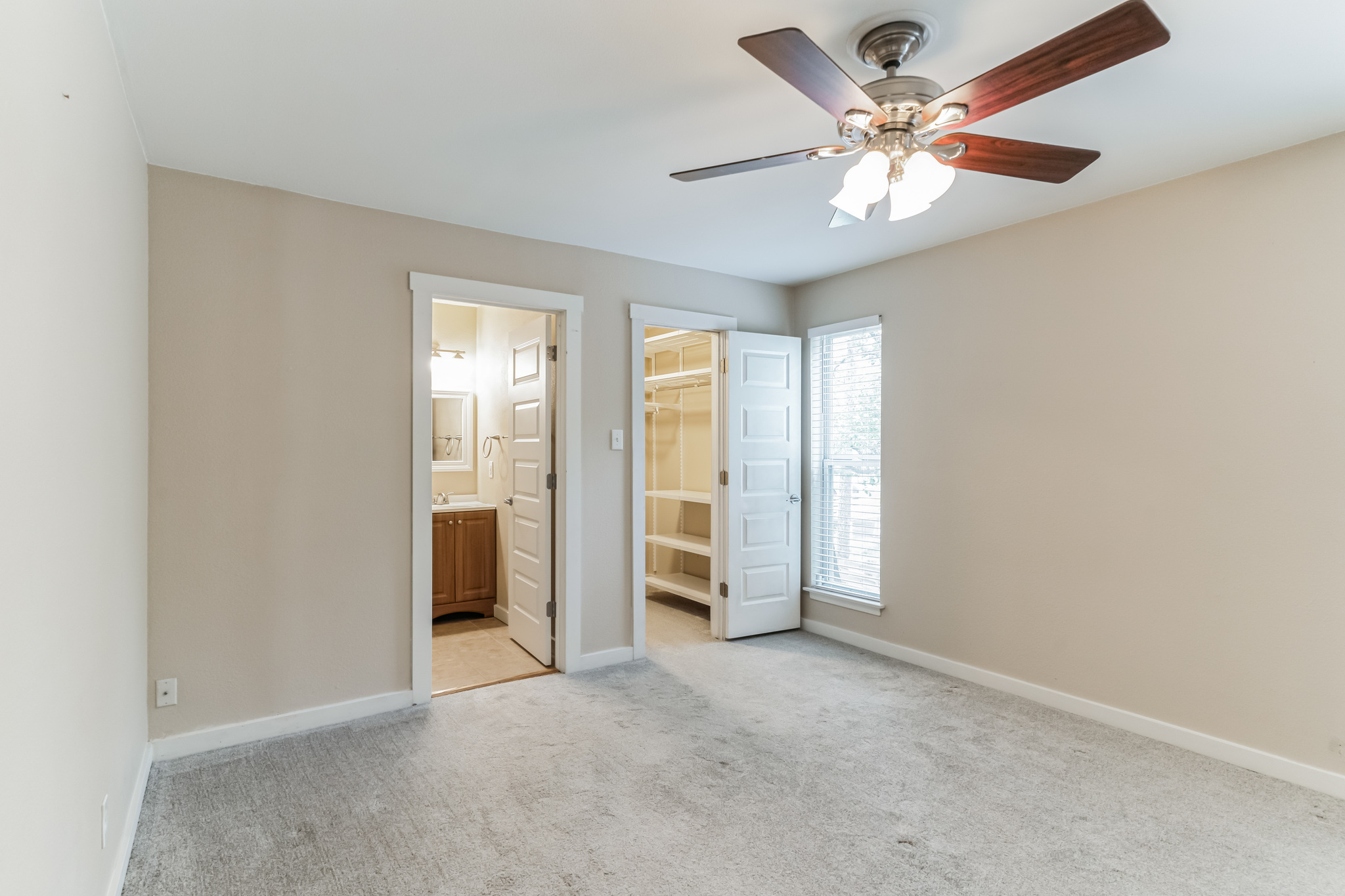 3214 Clawson Road, Unit A Austin, TX 78704 - Photo 12 of 26 A comfortable bedroom with soft carpeting and convenient access to a private bathroom and closet space.