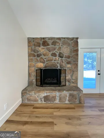 a living room with a fireplace