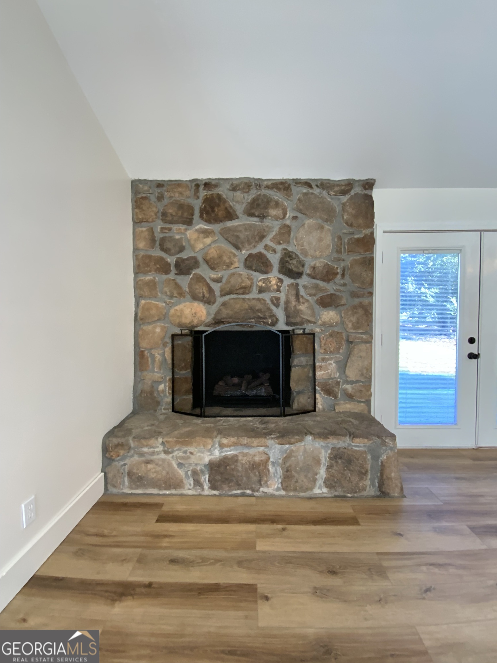 5569 Fosters Mill Road Cave Spring, GA 30124 - Photo 9 of 19 a living room with a fireplace
