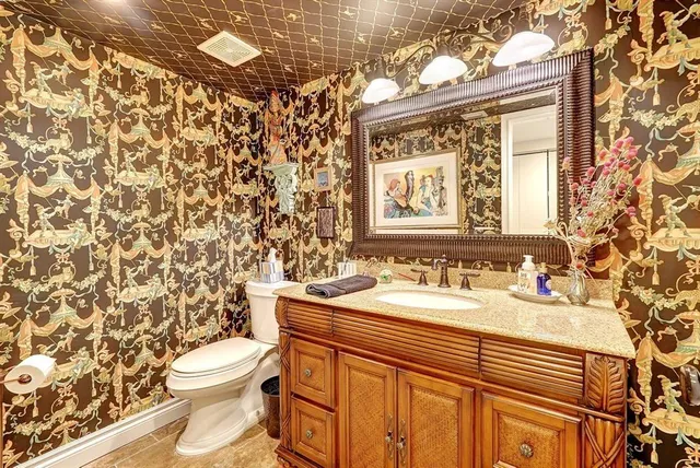 a spacious bedroom with a bed and a table