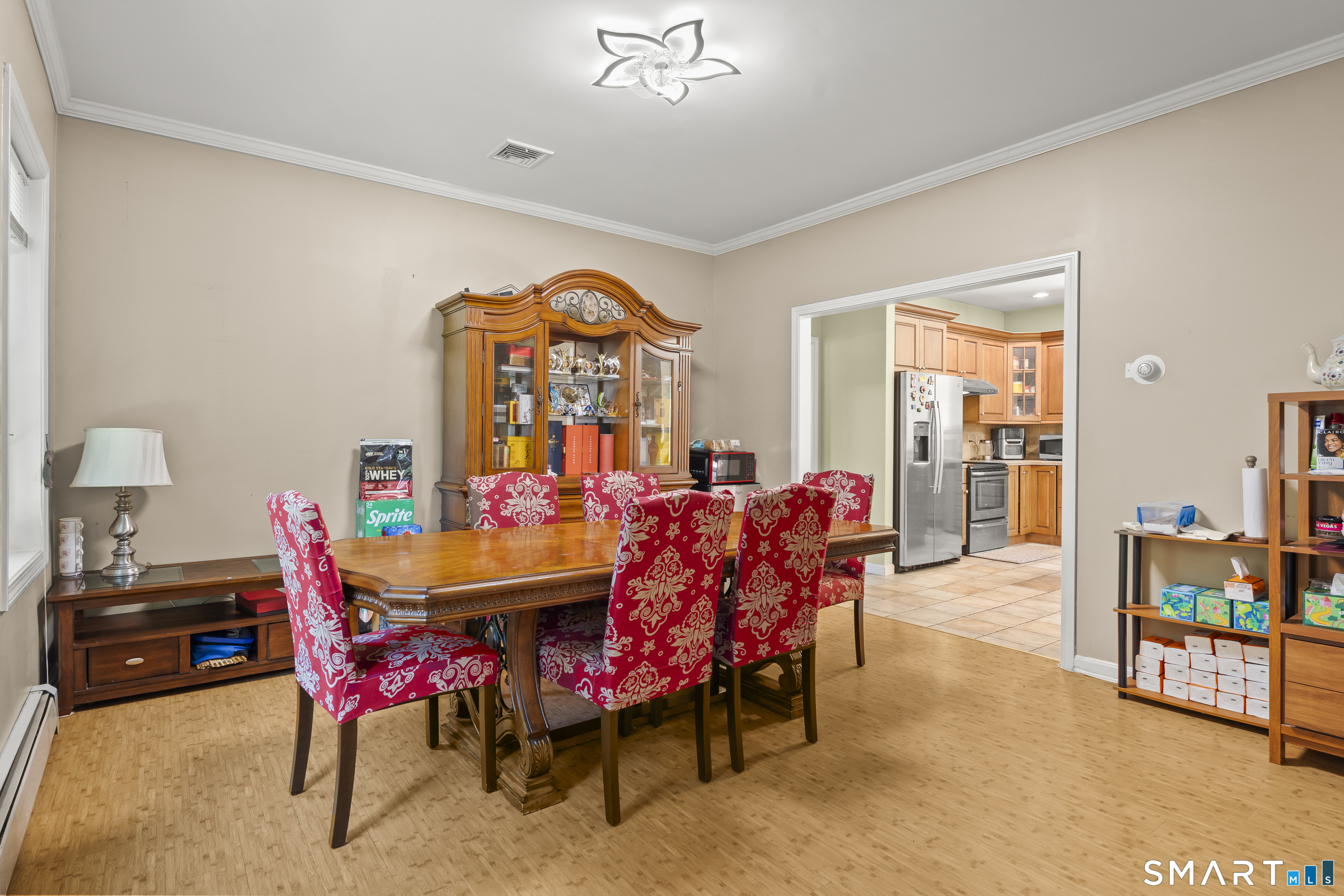 52 Middle Road Preston, CT 06365 - Photo 11 of 39 a view of a dining room with furniture and chandelier