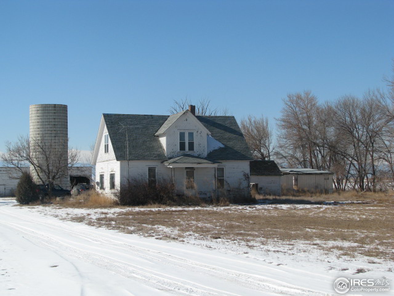 8381 East County Line Road Longmont, CO 80504 - Photo 1 of 18 a view of a house next to a yard with big house