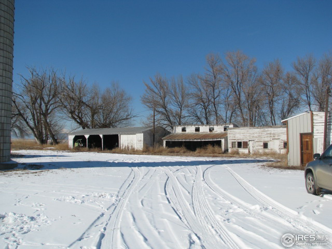 8381 East County Line Road Longmont, CO 80504 - Photo 6 of 18 a view of a house with a yard
