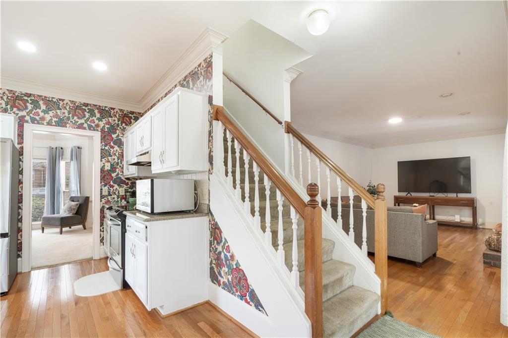 224 Rolling Oaks Drive Rome, GA 30165 - Photo 35 of 55 a view of a livingroom with wooden floor and furniture