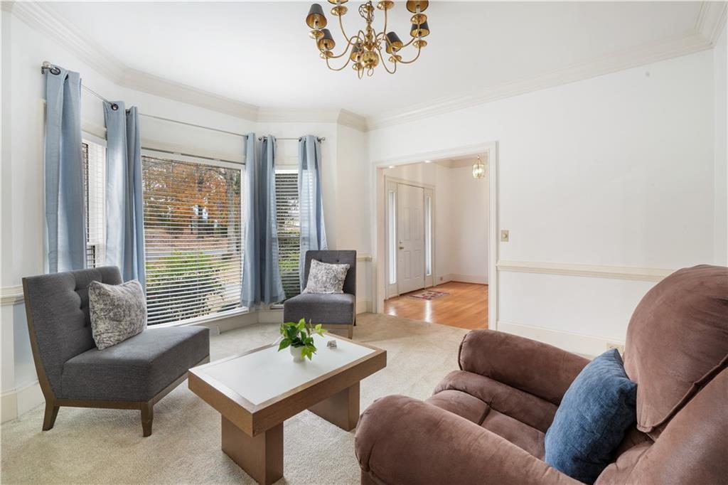 224 Rolling Oaks Drive Rome, GA 30165 - Photo 45 of 55 a living room with furniture and a large window