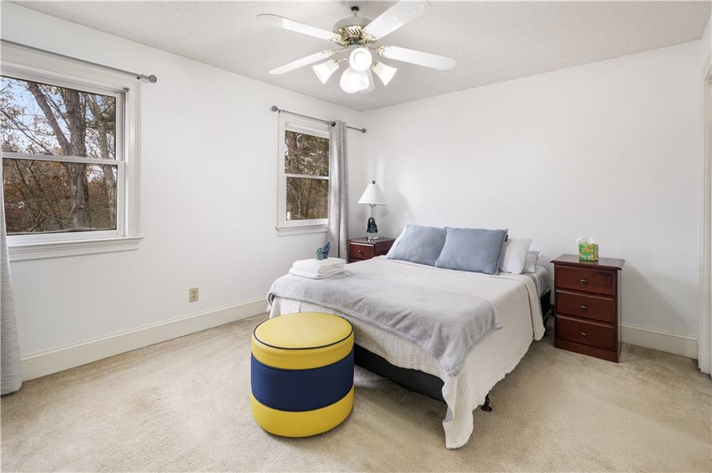 224 Rolling Oaks Drive Rome, GA 30165 - Photo 8 of 55 a bedroom with a bed and window