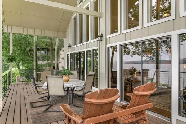 a room with furniture and a flat screen tv