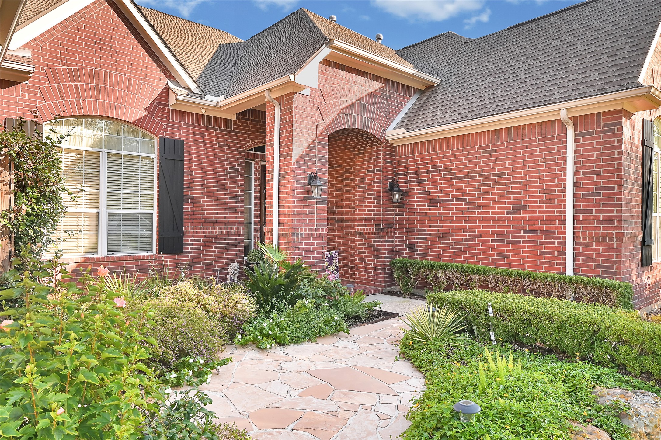 2118 Cias Trail Lane Spring, TX 77386 - Photo 2 of 46 Charming flagstone walkway up to the home!