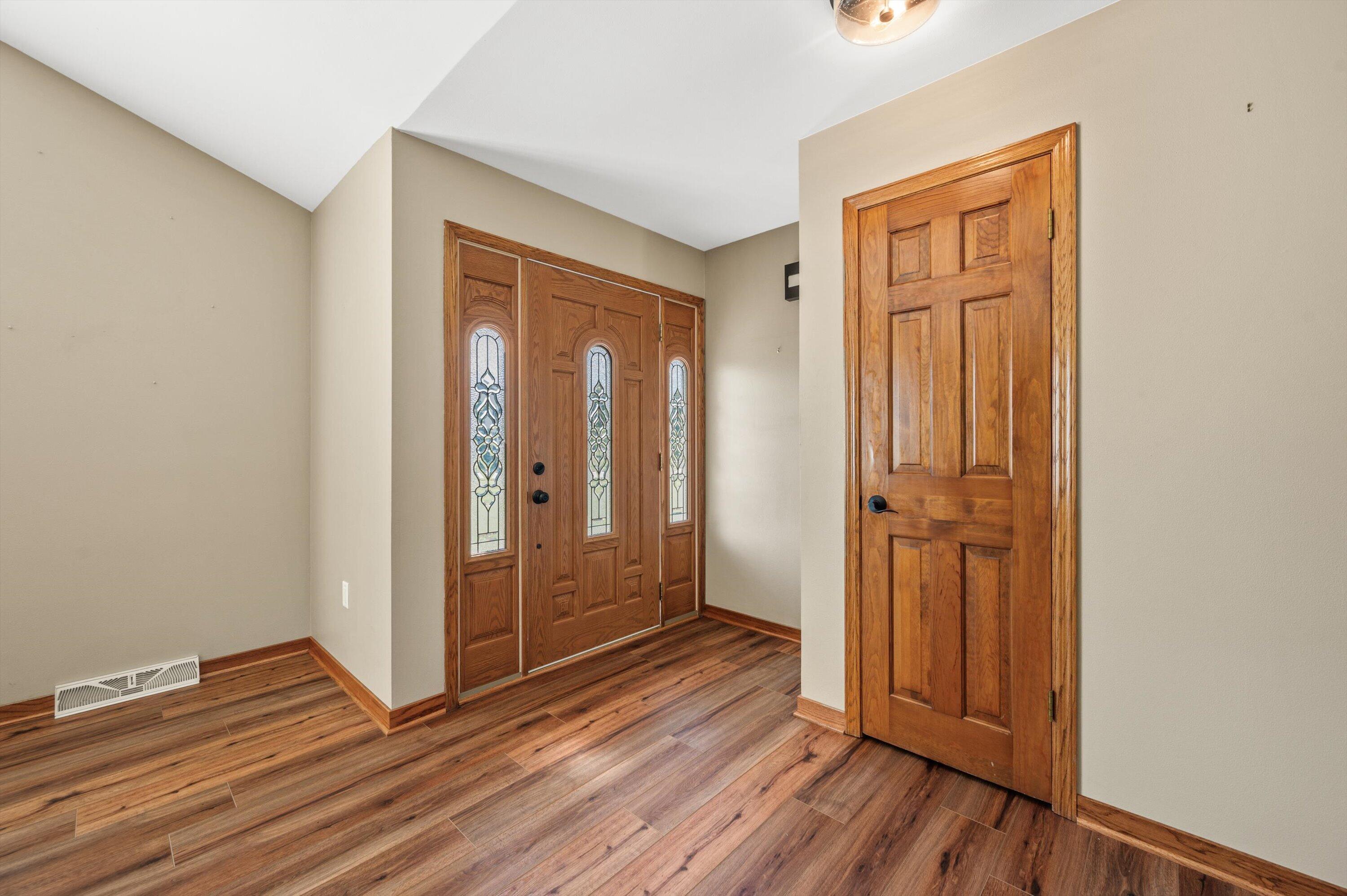 2803 Ridgeline Circle Waukesha, WI 53188 - Photo 5 of 38 Front Entry into Living Space