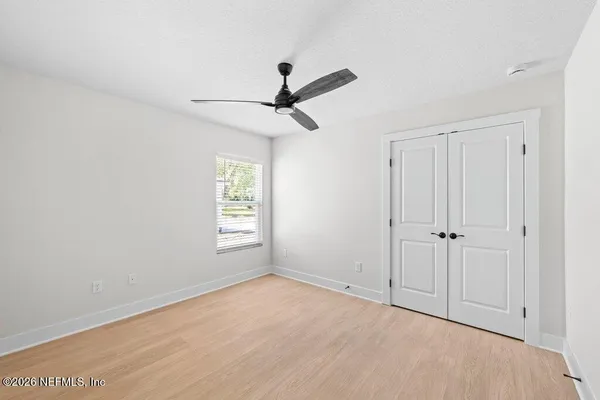 a view of an empty room and window