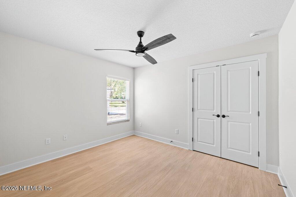 9680 Taylor Field Road Jacksonville, FL 32222 - Photo 21 of 27 a view of an empty room and window