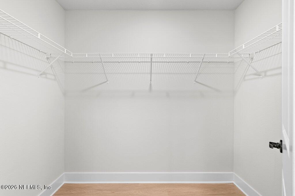 9680 Taylor Field Road Jacksonville, FL 32222 - Photo 26 of 27 a view of a room with racks on the wall