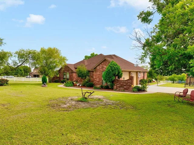 a house view with a garden space