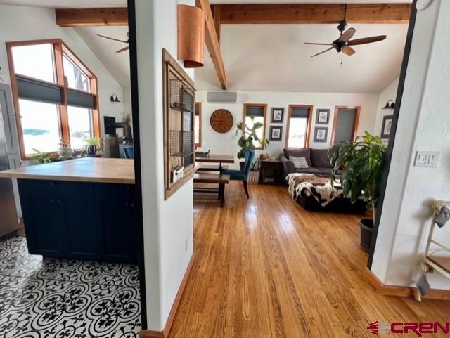 64130 Peach Valley Road Crawford, CO 81415 - Photo 11 of 33 a living room with furniture and a wooden floor