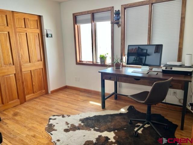 64130 Peach Valley Road Crawford, CO 81415 - Photo 20 of 33 a workspace with furniture and window