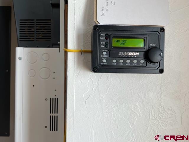 64130 Peach Valley Road Crawford, CO 81415 - Photo 26 of 33 a bathroom with a stove and a microwave
