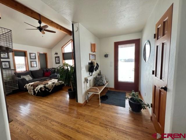 64130 Peach Valley Road Crawford, CO 81415 - Photo 4 of 33 a living room with furniture and a wooden floor