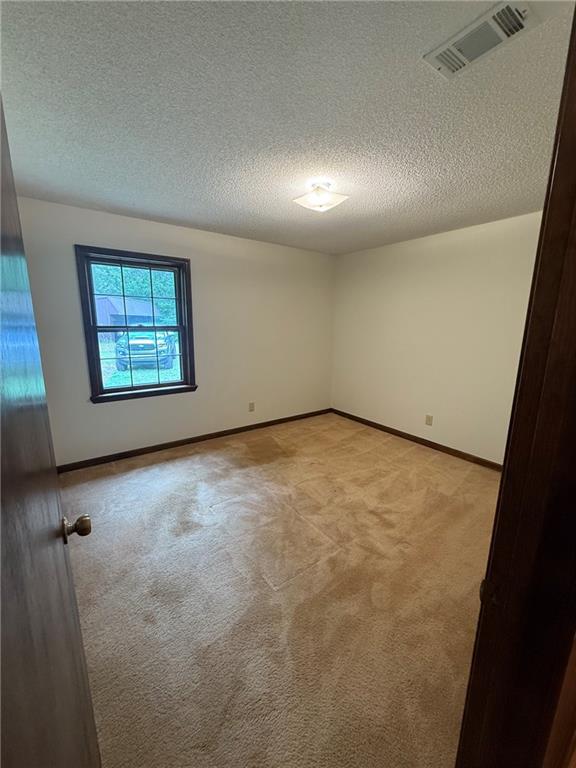 1565 Shoal Creek Road Cleveland, GA 30528 - Photo 31 of 38 an empty room with windows