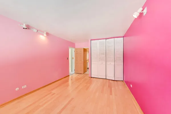 a bathroom with a sink toilet vanity and tub