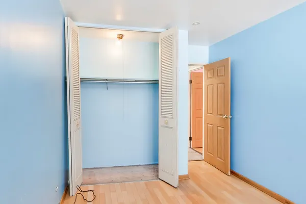 a bathroom with a sink vanity and a mirror