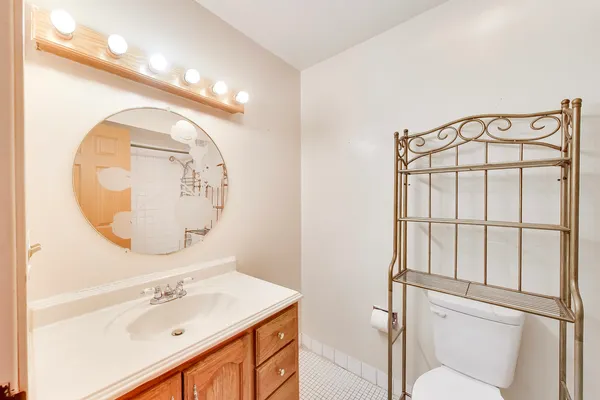 a bathroom with a shower and a bath tub