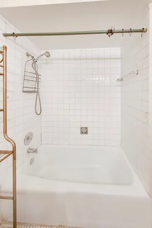 a view of a brick building from a balcony