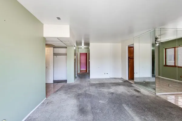 a view of empty room with windows