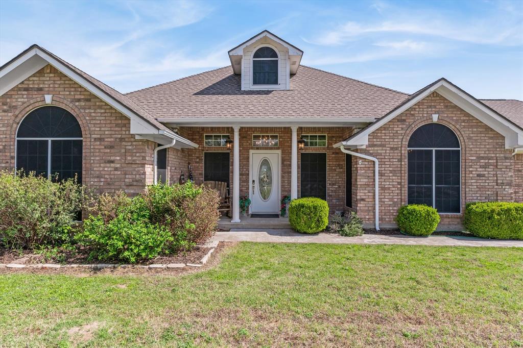 271 VZ County Road Canton, TX 75103 - Photo 5 of 40 a front view of a house with garden